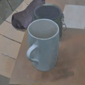A still life of a cup, turpentine and a sock.